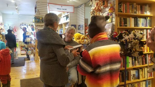 James Nelson speaks to customers at book signing at Dolly's in Park City, Utah