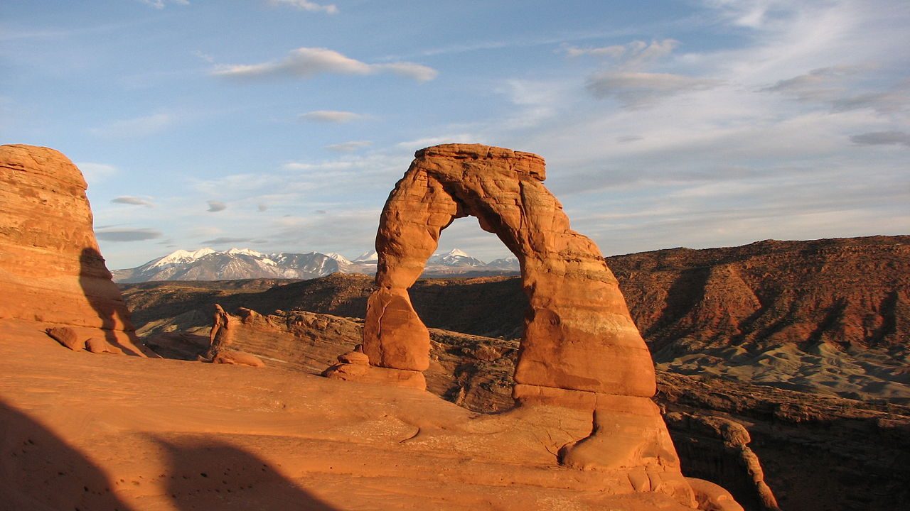Delicate Arch glowing at sunset in Arches National Park