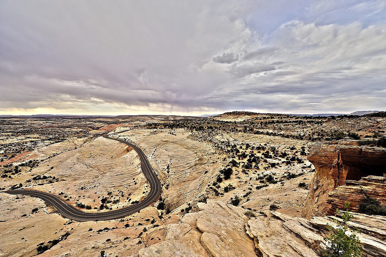 Layered red cliffs along a southern Utah scenic drive