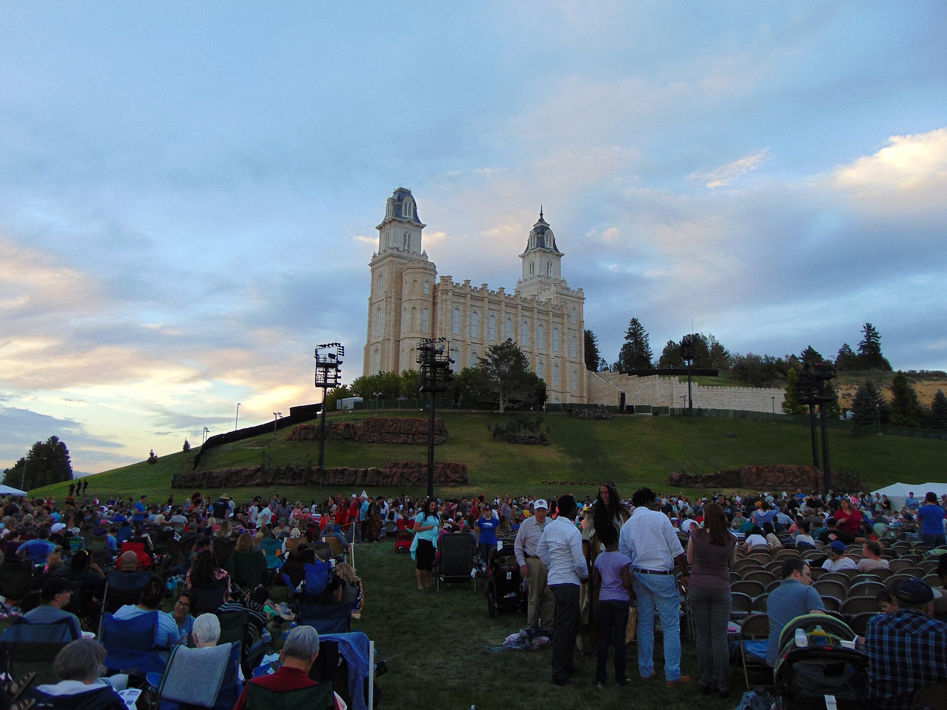 Audience seated on the south lawn below the Manti Utah Temple before the Mormon Miracle Pageant