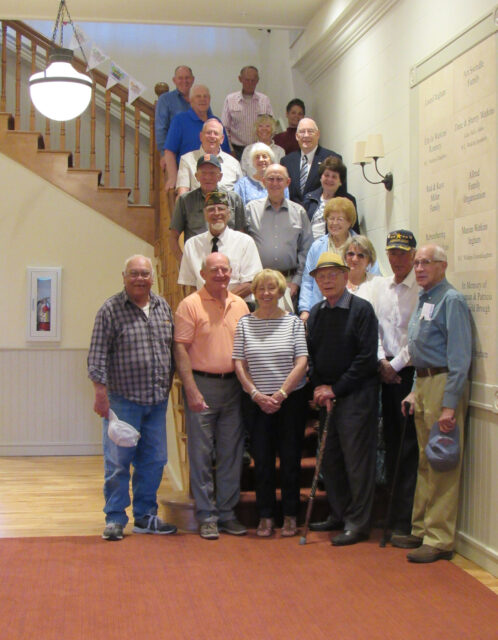 Friends of Historic Spring City members gathered on the staircase in the Old School